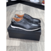 chaussure en cuire
